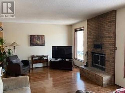 920 Quandt Crescent, La Ronge, SK - Indoor Photo Showing Living Room With Fireplace