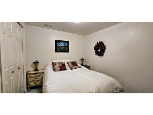 4983 Mcgrath Avenue, Canal Flats, BC - Indoor Photo Showing Bedroom