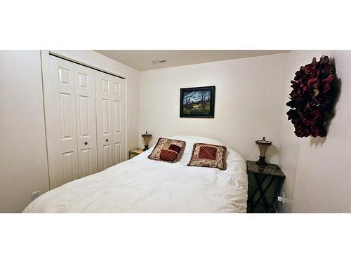 4983 Mcgrath Avenue, Canal Flats, BC - Indoor Photo Showing Bedroom