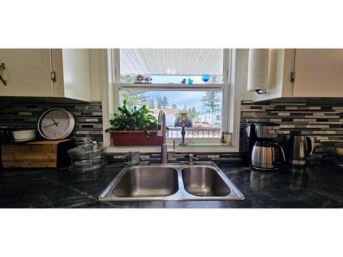 4983 Mcgrath Avenue, Canal Flats, BC - Indoor Photo Showing Kitchen With Double Sink