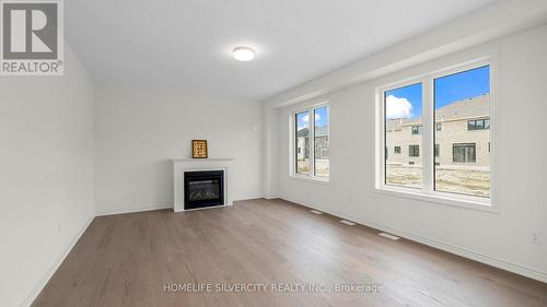 62 Sandhill Crescent, Adjala-Tosorontio (Colgan), ON - Indoor With Fireplace