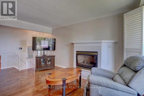 26 Stephenfrank Road, Toronto, ON - Indoor Photo Showing Living Room With Fireplace