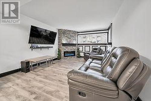 113 - 120 Bell Farm Road, Barrie, ON - Indoor With Fireplace