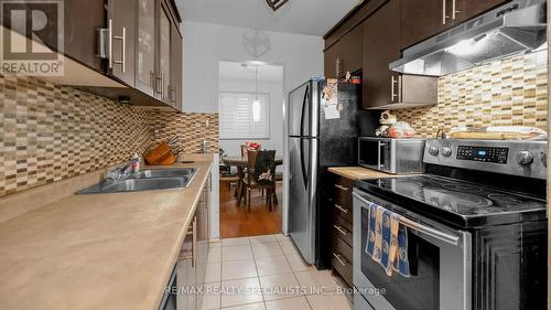 65 - 1 Gloucester Place, Brampton, ON - Indoor Photo Showing Kitchen With Double Sink With Upgraded Kitchen