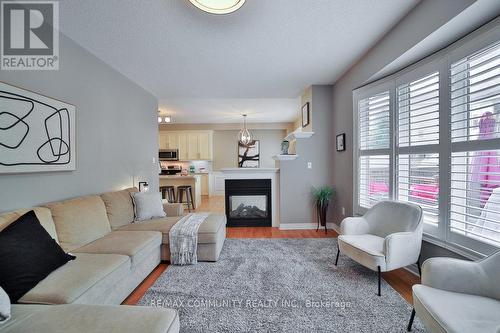 30 Cedarsprings Way, Brampton, ON - Indoor Photo Showing Living Room With Fireplace