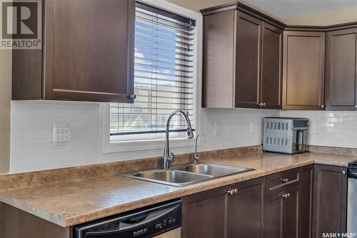 5104 110 Willis Crescent, Saskatoon, SK - Indoor Photo Showing Kitchen With Double Sink