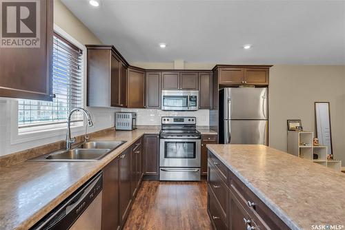 5104 110 Willis Crescent, Saskatoon, SK - Indoor Photo Showing Kitchen With Stainless Steel Kitchen With Double Sink