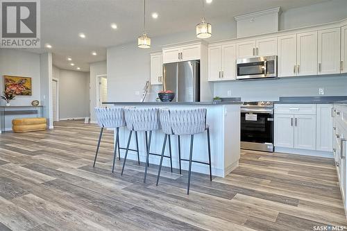 404 925 Centennial Boulevard, Warman, SK - Indoor Photo Showing Kitchen With Upgraded Kitchen