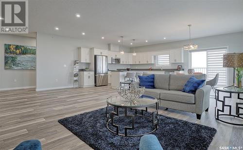 202 925 Centennial Boulevard, Warman, SK - Indoor Photo Showing Living Room