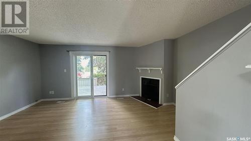 103 2703 Spadina Crescent E, Saskatoon, SK - Indoor With Fireplace