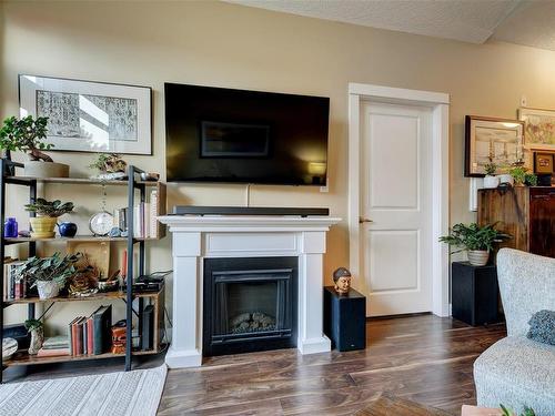 311-938 Dunford Ave, Langford, BC - Indoor Photo Showing Living Room With Fireplace