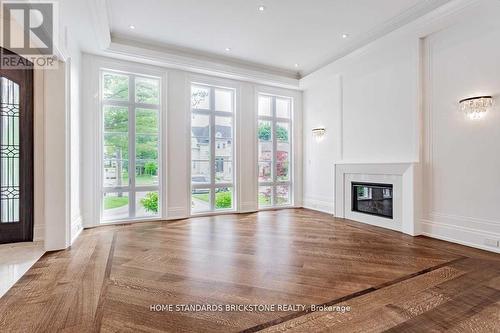 20 Berkindale Drive, Toronto, ON - Indoor Photo Showing Other Room With Fireplace