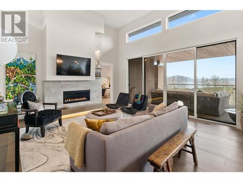 472 Sparrow Hawk Court, Kelowna, BC - Indoor Photo Showing Living Room With Fireplace