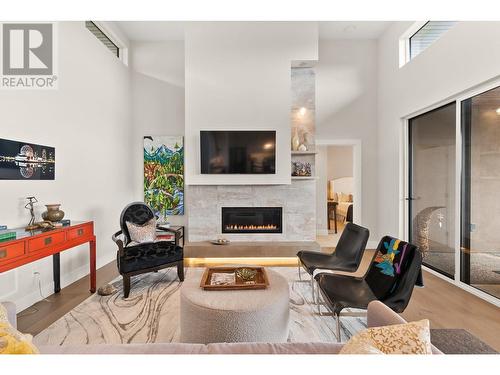 472 Sparrow Hawk Court, Kelowna, BC - Indoor Photo Showing Living Room With Fireplace