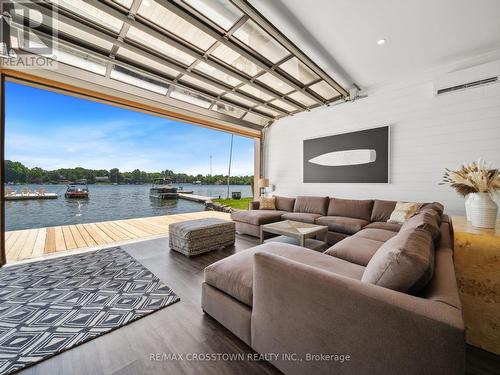 201 Cedar Island Road, Orillia, ON - Indoor Photo Showing Living Room With Body Of Water