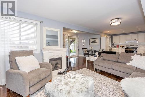 50 Dunnett Drive, Barrie, ON - Indoor Photo Showing Living Room With Fireplace