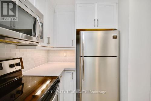 1208 - 140 Dunlop Street E, Barrie, ON - Indoor Photo Showing Kitchen With Stainless Steel Kitchen