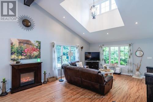 1240 Methodist Point Road, Tiny, ON - Indoor Photo Showing Living Room With Fireplace