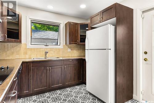 823 Shannon Road, Regina, SK - Indoor Photo Showing Kitchen With Double Sink