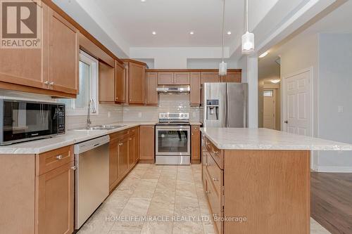 7790 Hanniwell Street, Niagara Falls, ON - Indoor Photo Showing Kitchen With Double Sink