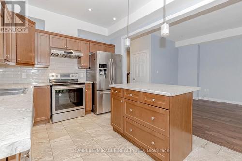 7790 Hanniwell Street, Niagara Falls, ON - Indoor Photo Showing Kitchen With Double Sink