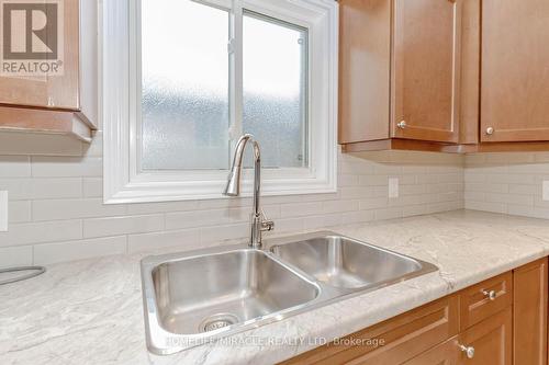 7790 Hanniwell Street, Niagara Falls, ON - Indoor Photo Showing Kitchen With Double Sink