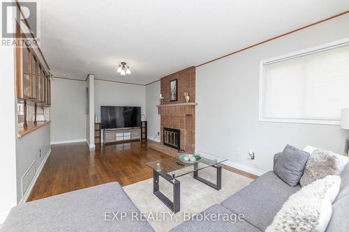 69 Lord Simcoe Drive, Brampton, ON - Indoor Photo Showing Living Room With Fireplace