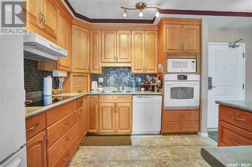 506 902 Spadina Crescent E, Saskatoon, SK - Indoor Photo Showing Kitchen With Double Sink