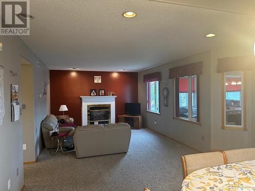 905 Sinotte Crescent, La Ronge, SK - Indoor Photo Showing Living Room With Fireplace