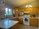 905 Sinotte Crescent, La Ronge, SK  - Indoor Photo Showing Kitchen With Double Sink 