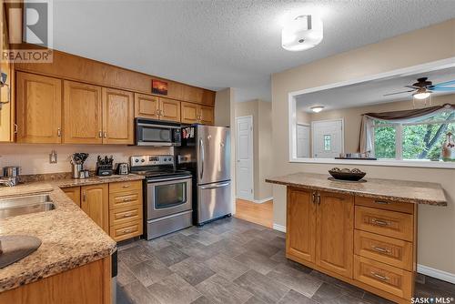 445 Simon Fraser Crescent, Saskatoon, SK - Indoor Photo Showing Kitchen With Stainless Steel Kitchen With Double Sink