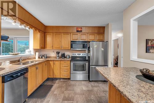 445 Simon Fraser Crescent, Saskatoon, SK - Indoor Photo Showing Kitchen With Stainless Steel Kitchen With Double Sink