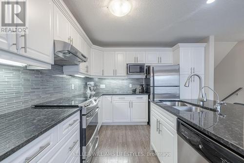 3413 Castle Rock Place, London, ON - Indoor Photo Showing Kitchen With Double Sink With Upgraded Kitchen
