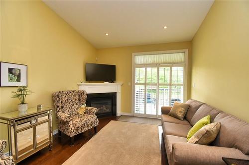 26 Toulon Avenue, Hamilton, ON - Indoor Photo Showing Living Room With Fireplace