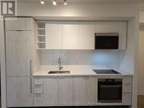 320 - 2033 Kennedy Road, Toronto, ON - Indoor Photo Showing Kitchen