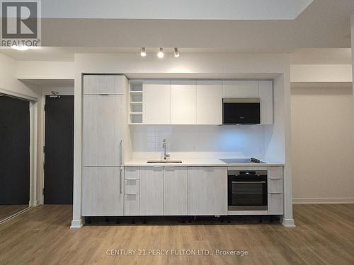 320 - 2033 Kennedy Road, Toronto, ON - Indoor Photo Showing Kitchen