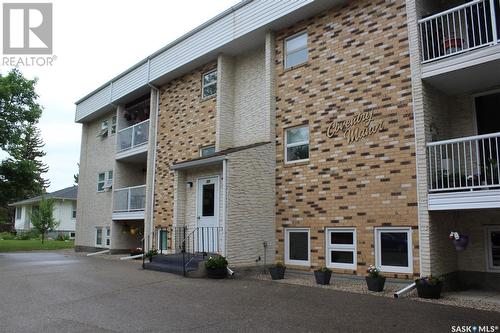 21 228 3Rd Street, Weyburn, SK - Outdoor With Balcony With Facade