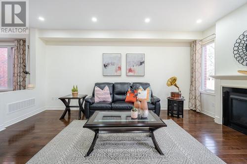 13 Isaac Devins Boulevard, Toronto, ON - Indoor Photo Showing Living Room With Fireplace