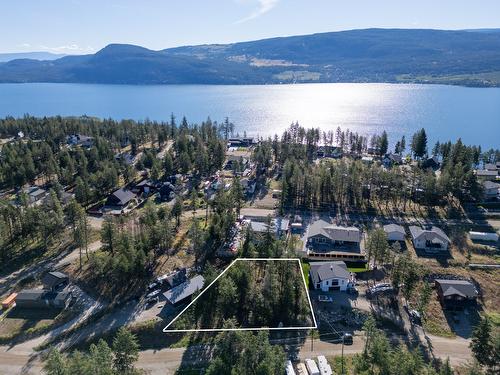 7115 Dunwaters Road, Kelowna, BC - Outdoor With Body Of Water With View