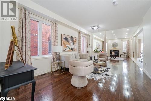 13 Isaac Devins Boulevard, Toronto, ON - Indoor Photo Showing Living Room With Fireplace