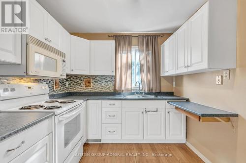 35 Mowat Crescent, Barrie, ON - Indoor Photo Showing Kitchen With Double Sink