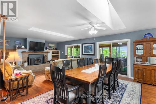 96 Suter Drive, Kawartha Lakes, ON - Indoor Photo Showing Dining Room With Fireplace