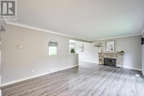 98 Prince Charles Drive, St. Catharines, ON - Indoor Photo Showing Living Room With Fireplace