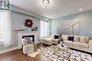 20 Britannic Lane, Barrie (Innis-Shore), ON  - Indoor Photo Showing Living Room With Fireplace 