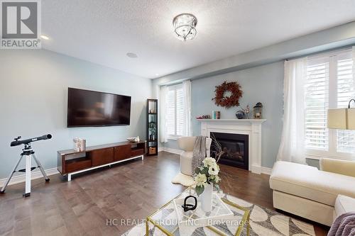 20 Britannic Lane, Barrie, ON - Indoor Photo Showing Living Room With Fireplace