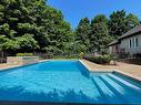 Piscine - 14200 Rue Guillaume-Alarie, Mirabel, QC  - Outdoor With In Ground Pool With Backyard 