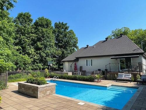 Face arriÃ¨re - 14200 Rue Guillaume-Alarie, Mirabel, QC - Outdoor With In Ground Pool With Deck Patio Veranda With Backyard