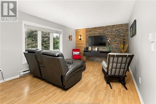 76 Berry St, Moncton, NB - Indoor Photo Showing Living Room With Fireplace