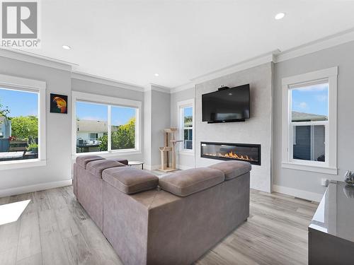 229 Tupman Crescent, Kelowna, BC - Indoor Photo Showing Living Room With Fireplace