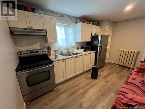 105-107, 109, 111-115 Mecklenburg, Saint John, NB - Indoor Photo Showing Kitchen With Double Sink